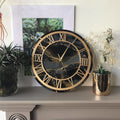alt="black resin wall clock with golden frame luxury handmade designer wall clock for modern home decor"